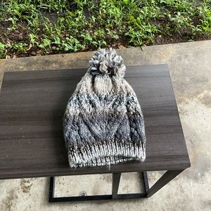 Blue and grey knitted hat.